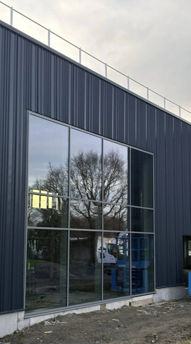 Baie vitrée aluminium sur bardage